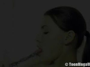 Dildo Between The Cunt Lips Of A Tight Teen Girl